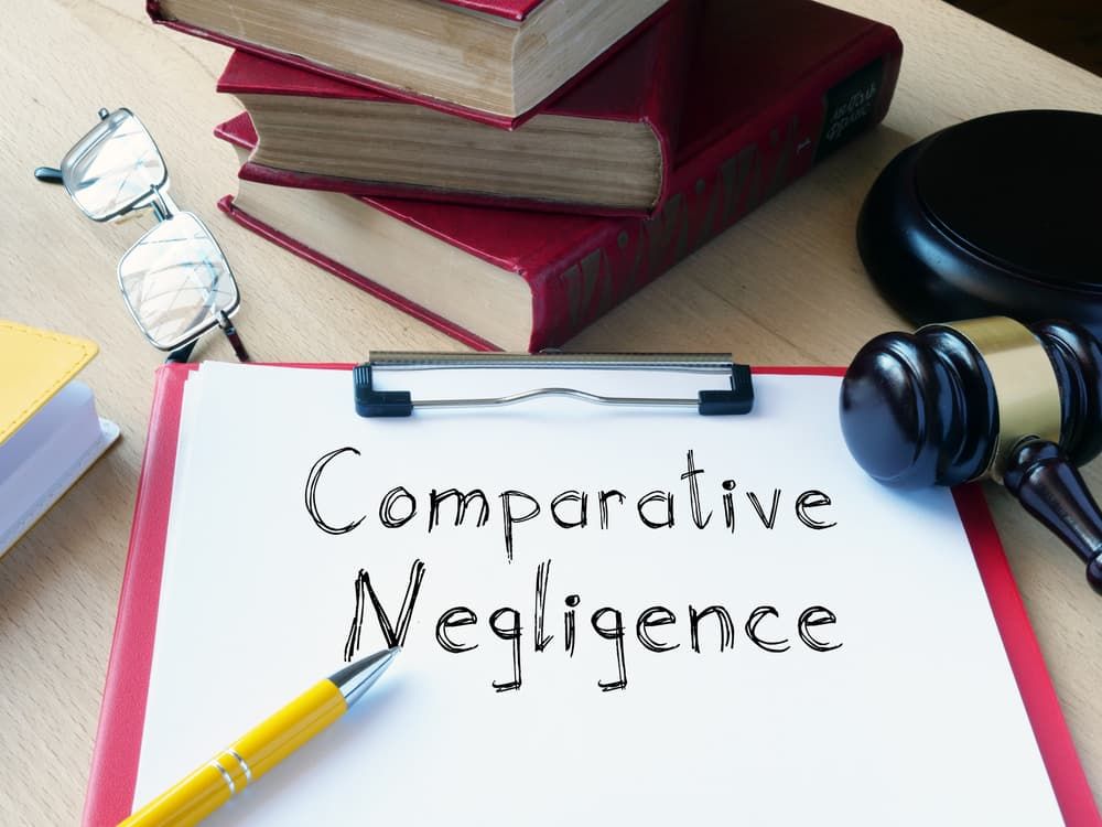Comparative Negligence is shown on the conceptual photo using the text.