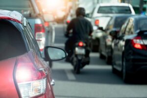 A motorcycle in a heavy traffic